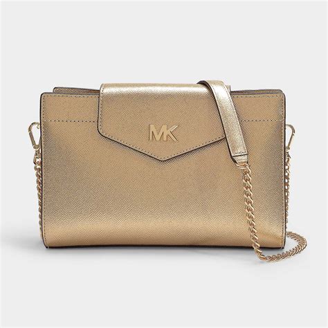 michael kors clutch silver|michael kors metallic gold handbags.